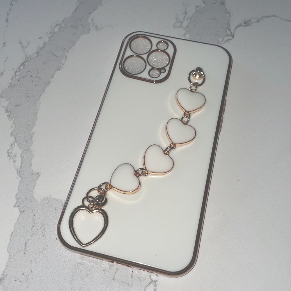 iPhone NWT 12 Pro Max Case white with gold detail & bracelet! So super cute!